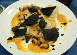 Monna Lisa ravioli in saffron sauce with mussels and truffles