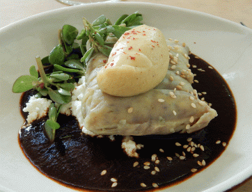 Criollo tamal with platano puree and mole