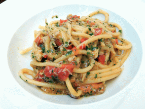 Ristrot Guviol spaghetto with crab and grape tomatoes uncovered