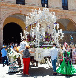 carriage bearing banner of the Virgin on visit to Santuario de la Victoria