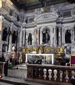 Far left is the treasured bust of San Gennaro; the bronze statue of the saint is in the center. The ampules of San Gennaro's blood are locked in a safe behind this altar in the Royal Chapel of the Treasury.